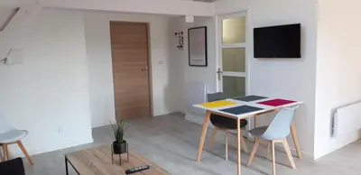 Télévision ou salle de divertissement dans l'établissement Studio de charme entièrement rénové