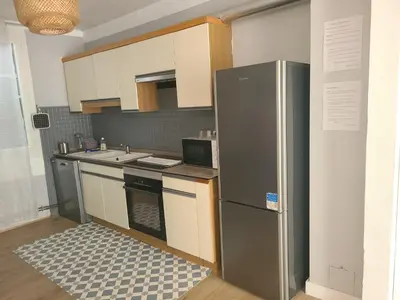 Cuisine ou kitchenette dans l'établissement Maison 3 chambres au calme