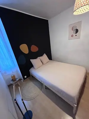 Un ou plusieurs lits dans un hébergement de l'établissement La pause Biardaise -Appartement 2 chambres à Biard