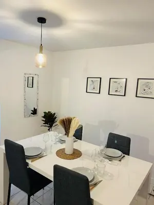 Coin salon dans l'établissement La pause Biardaise -Appartement 2 chambres à Biard