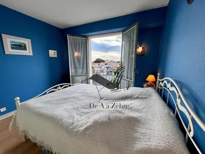 Un ou plusieurs lits dans un hébergement de l'établissement Le Boyard - En plein coeur de ville avec vue sur l'Océan