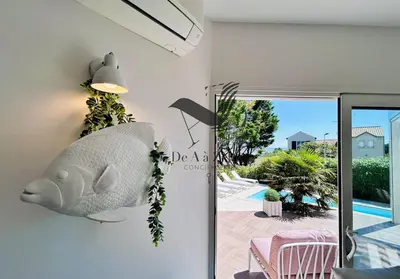 Piscine de l'établissement Maison de Famille - Piscine chauffée et vue sur l'Océan Atlantique ou située à proximité