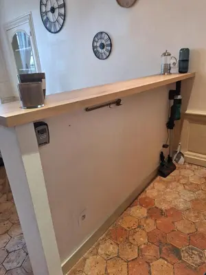 Cuisine ou kitchenette dans l'établissement Le Clémenceau face à la Charente 2 chambres