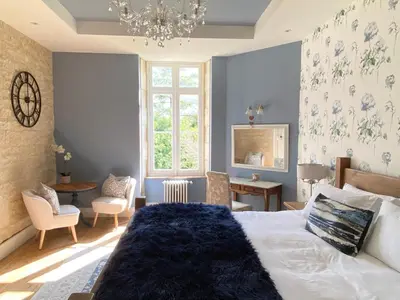 Un ou plusieurs lits dans un hébergement de l'établissement La Montgrande Bed & Breakfast