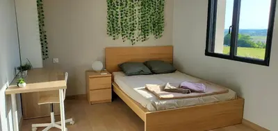 Un ou plusieurs lits dans un hébergement de l'établissement Magnifique villa 5 étoiles avec piscine proche Futuroscope & Golf