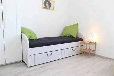 Un ou plusieurs lits dans un hébergement de l'établissement Appt 3 pièces LA ROCHELLE - LR360-307