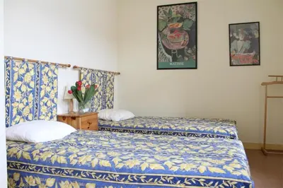 Un ou plusieurs lits dans un hébergement de l'établissement Studio La Rochelle - LR180-010