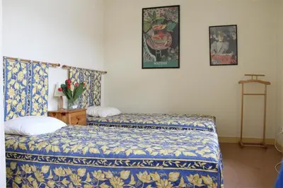 Un ou plusieurs lits dans un hébergement de l'établissement Studio La Rochelle - LR180-010