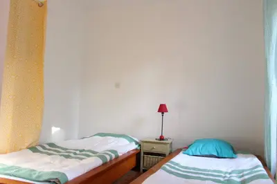 Un ou plusieurs lits dans un hébergement de l'établissement Appt 3 pièces LA ROCHELLE - LR180-030