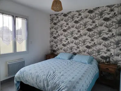 Un ou plusieurs lits dans un hébergement de l'établissement Maison de vacances 6 personnes