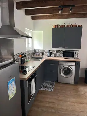 Cuisine ou kitchenette dans l'établissement Les granges