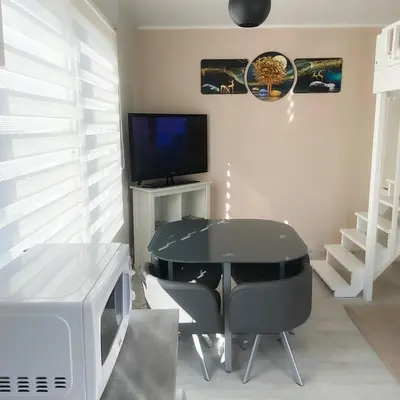 Télévision ou salle de divertissement dans l'établissement Studio Cosy