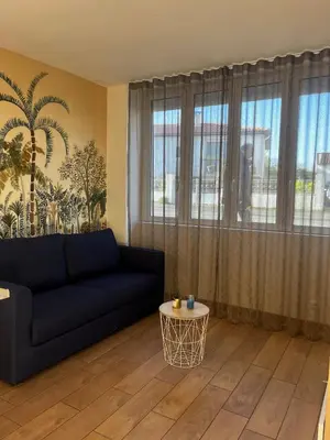 Coin salon dans l'établissement Studio porte royale
