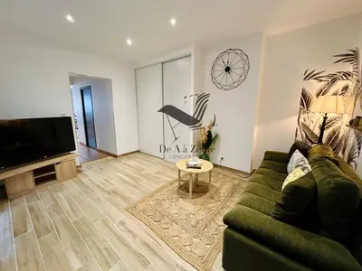 Télévision ou salle de divertissement dans l'établissement Le Gambetta - Proche du centre-ville et des thermes