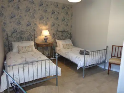 Un ou plusieurs lits dans un hébergement de l'établissement The Coachhouse Gite
