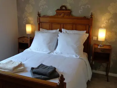 Un ou plusieurs lits dans un hébergement de l'établissement The Coachhouse Gite