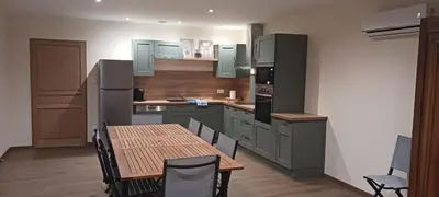 Cuisine ou kitchenette dans l'établissement La maison du Vicomte