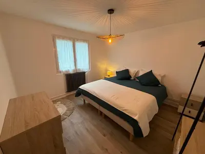 Un ou plusieurs lits dans un hébergement de l'établissement Appartment Jumapi