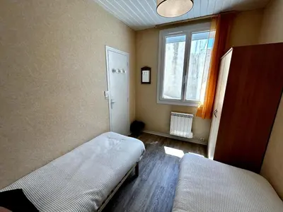 Un ou plusieurs lits dans un hébergement de l'établissement La Salamandre - Situé en plein coeur de ville et proche des thermes