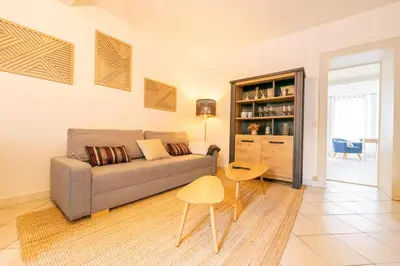 Coin salon dans l'établissement Appartement de l'ammonite