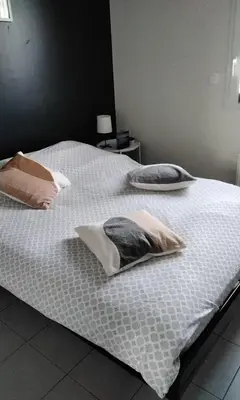 Un ou plusieurs lits dans un hébergement de l'établissement Chambre chez josette