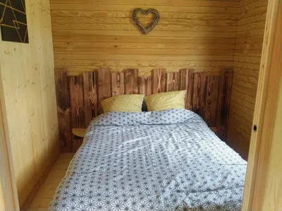Un ou plusieurs lits dans un hébergement de l'établissement tom Sawyer cabane flottante