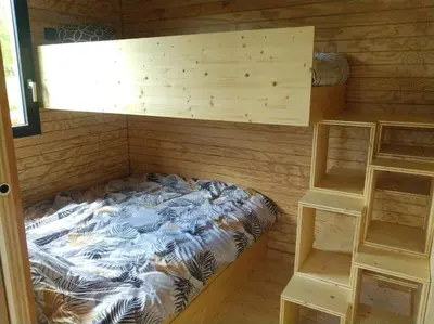 Un ou plusieurs lits dans un hébergement de l'établissement tom Sawyer cabane flottante