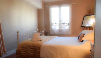 Un ou plusieurs lits dans un hébergement de l'établissement Maison Deux