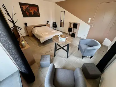Un ou plusieurs lits dans un hébergement de l'établissement Chez Marcel - Maison 3 chambres