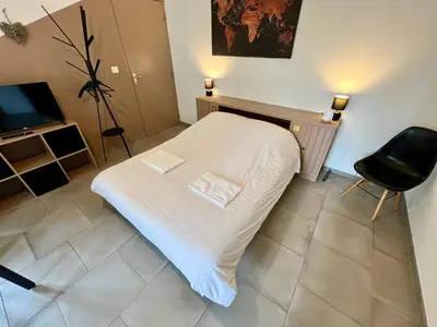 Un ou plusieurs lits dans un hébergement de l'établissement Chez Marcel - Maison 3 chambres