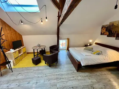 Un ou plusieurs lits dans un hébergement de l'établissement Chez Marcel - Maison 3 chambres