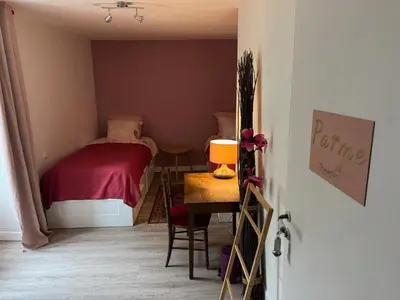 Un ou plusieurs lits dans un hébergement de l'établissement Moulin De La Parenthèse