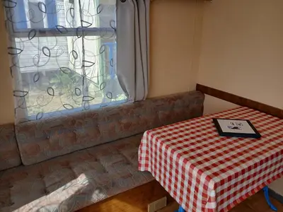Coin salon dans l'établissement Camping de la cigogne