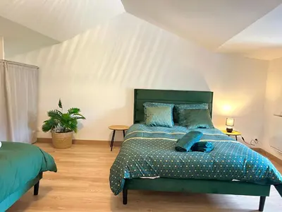 Un ou plusieurs lits dans un hébergement de l'établissement Villa Verde, magnifique gite à 10 min du Futuroscope