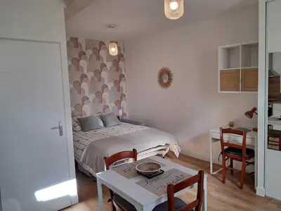 Un ou plusieurs lits dans un hébergement de l'établissement Studio 3 Cozy Proche du centre ville