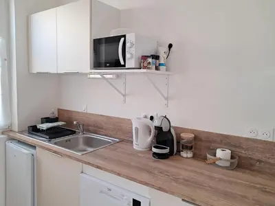 Cuisine ou kitchenette dans l'établissement Studio 3 Cozy Proche du centre ville