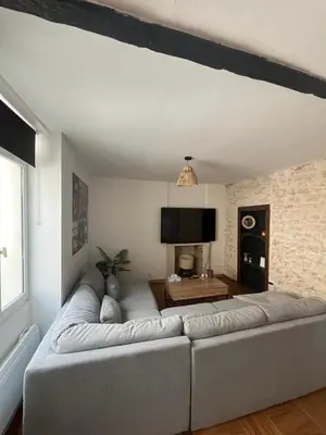 Coin salon dans l'établissement Cozy apartment Gare