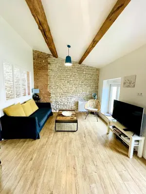 Télévision ou salle de divertissement dans l'établissement L'Atelier - Coeur de ville