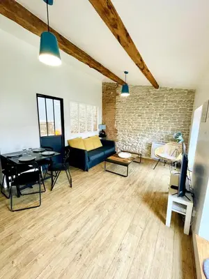 Coin salon dans l'établissement L'Atelier - Coeur de ville