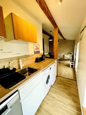 Cuisine ou kitchenette dans l'établissement L'Atelier - Coeur de ville