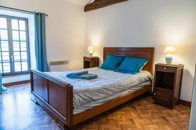 Un ou plusieurs lits dans un hébergement de l'établissement Gîte du Pin - Abbaye Béruges