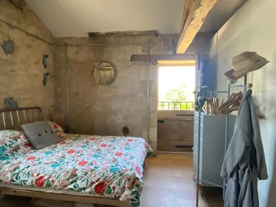 Un ou plusieurs lits dans un hébergement de l'établissement La Petite Grande Maison près de Chauvigny