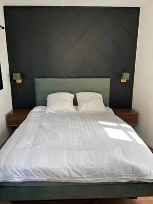 Un ou plusieurs lits dans un hébergement de l'établissement Appartement plein coeur de ville
