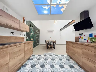 Télévision ou salle de divertissement dans l'établissement Le loft du canal de Rompsay