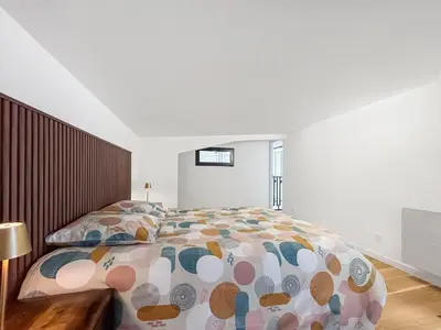 Un ou plusieurs lits dans un hébergement de l'établissement Le loft du canal de Rompsay