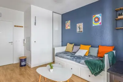 Un ou plusieurs lits dans un hébergement de l'établissement Studio with balcony in the heart of La Rochelle