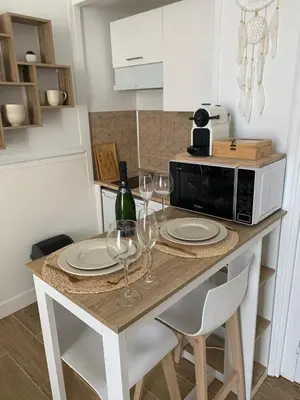 Cuisine ou kitchenette dans l'établissement La Suite Bohème