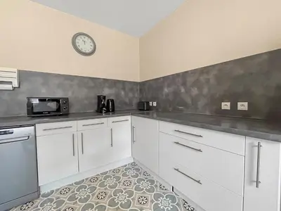 Cuisine ou kitchenette dans l'établissement Maison Au Calme à 5min du Futuroscope