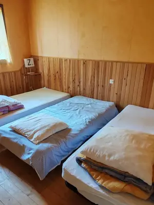 Un ou plusieurs lits dans un hébergement de l'établissement Domaine la butte de Lauray