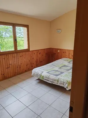 Un ou plusieurs lits dans un hébergement de l'établissement Domaine la butte de Lauray